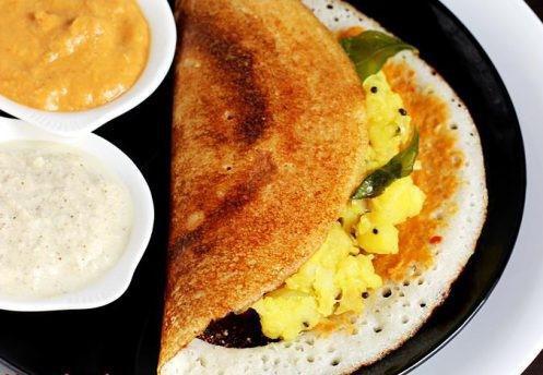 Masala Dosa · Vegan & Vegetarian- Dosa, thin rice crepes stuffed with mashed potato served with sambar and chutneys