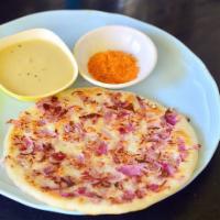 Onion Uttapam · Vegan & Vegetarian-South Indian thick pancake made from rice flour topped with chopped onion...