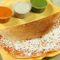 Paneer Dosa ·  Vegetarian- Dosa, thin rice crepes grated with cottage cheese served with sambar and chutneys