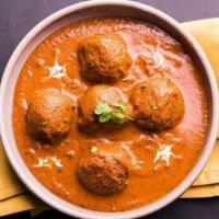 Malai Kofta Curry · Vegetarian- Dumplings made of cottage cheese, mixed vegetables in a creamy tomato sauce.