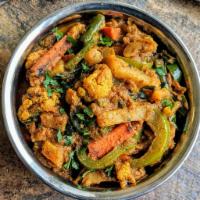 Kadai Vegetables Curry · Vegetarian- Mixed vegetables cooked in a cream based gravy