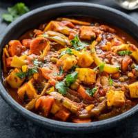 Vegetable Jalfrezi Curry · Vegan & Vegetarian- Mixed vegetables cooked in tomato based sauce spiked up with sautéed spi...