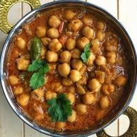 Punjabi Chole · Vegan & Vegetarian- Boiled white chickpeas cooked with spices sautéed in onion-tomato gravy ...