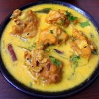 Kadi Pakoda/Punjabi Kadi · Vegetarian- Deep fried fritters dunked in a tangy yogurt based curry.