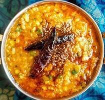 Dal Tadka · Vegan & Vegetarian- Yellow lentils sautéed with onions, tomatoes and spices
