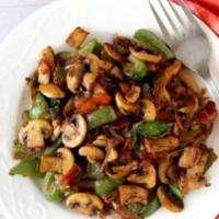 Pepper Mushroom Fry Curry · Vegan & Vegetarian- Sliced mushrooms and bell peppers sautéed with onions and spices.