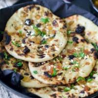 1 Kashmiri Naan · Vegetarian- Indian flat bread stuffed or topped with sweet dried fruits and nuts