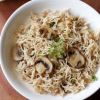 Mushroom Pulav · Vegan & Vegetarian- Basmati rice cooked with sliced mushrooms and traditional herbs and spices