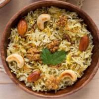 Kashmiri Pulav ·  Vegetarian- Basmati rice cooked in milk and traditional herbs and spices loaded with dried ...