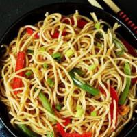 Vegetable Hakka Noodles · Vegan & Vegetarian- Steamed noodles tossed with vegetables and Chinese sauce.