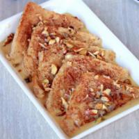 Double Ka Meetha ·  Vegetarian-Fried bread slices soaked in hot milk with spices 