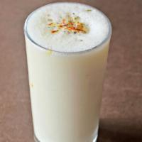Sweet Lassi · Frothy yogurt-based drink, flavoured with sugar and served cold