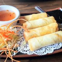 Egg Roll · Crispy rice paper wrapped with mixed vegetables and glass noodles.