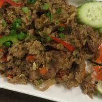 20. Basil Fried Rice · Stir fried Thai jasmine rice with garlic chili sauce, onions, basil, bell peppers, green bea...