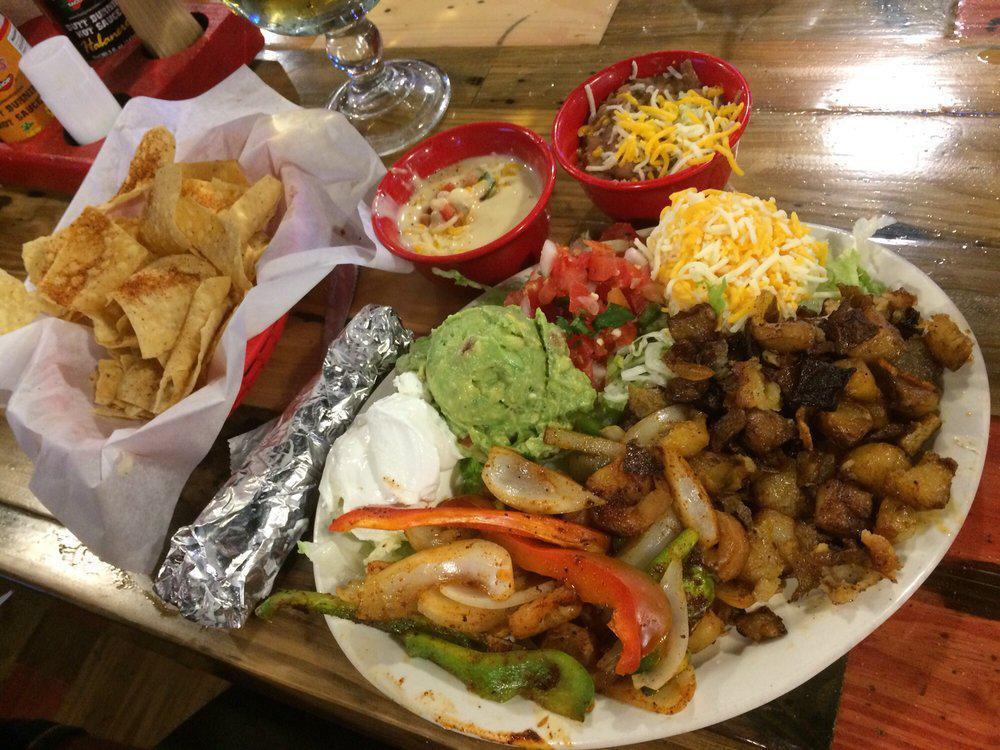 Shrimp Fajita Plate · Served with 3 flour tortillas, guacamole, lettuce, sour cream, shredded cheese and pico de gallo. Served with your choice of 2 sides.