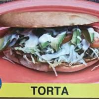 Torta Sandwich · Mexican bread grilled and topped with cheese, sour cream, tomatoes, onions, avocado, lettuce...