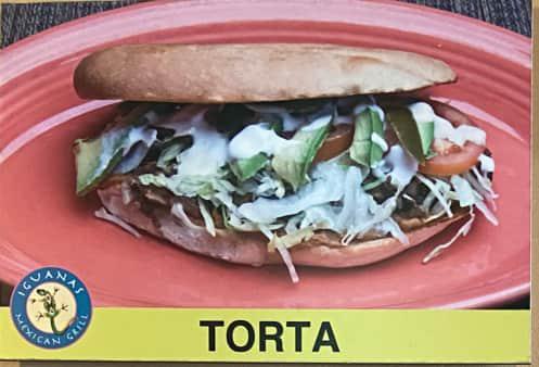 Torta Sandwich · Mexican bread grilled and topped with cheese, sour cream, tomatoes, onions, avocado, lettuce, choice of meat.
