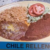 Chile Relleno Platillos · Passilla chile filled with cheese breaded and deep fried and topped with delicious sauce. In...