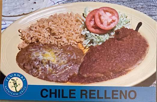 Chile Relleno Platillos · Passilla chile filled with cheese breaded and deep fried and topped with delicious sauce. Includes rice and beans.