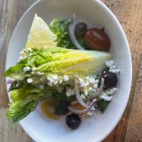Wedge Salad · Kalamata olives, goat cheese, red onion, heirloom tomatoes, macerated cherries and burnt ora...