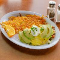 Baja Omelet · Diced bacon, tomatoes, green onions, pepper jack cheese, avocado slices, and sour cream.  In...