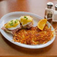 Egg Benedict · Poached egg on English muffin with ham and hollandaise sauce.