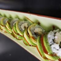 Caterpillar Roll · crab mix,cucumber and eel inside
top with avocado