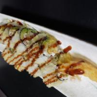 Crunch Roll · tempura shrimp ,crab mix and avocado inside
top with crunch and eel sauce
