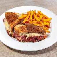 Con's Reuben Sandwich · Tender house corned beef, braised sauerkraut, swiss cheese, thousand island dressing, marble...