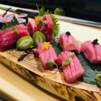 Bluefin Paradise  · 2pc Chu-Toro sushi, 2 Pc O-Toro sushi, 5pc Bluefin Tuna & 1 Toro Scallion Roll 