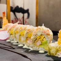 Sizzling Roll · Shrimp tempura, avocado, mango roll, wrapped w. soy paper, topped w. kani salad, eel sauce &...