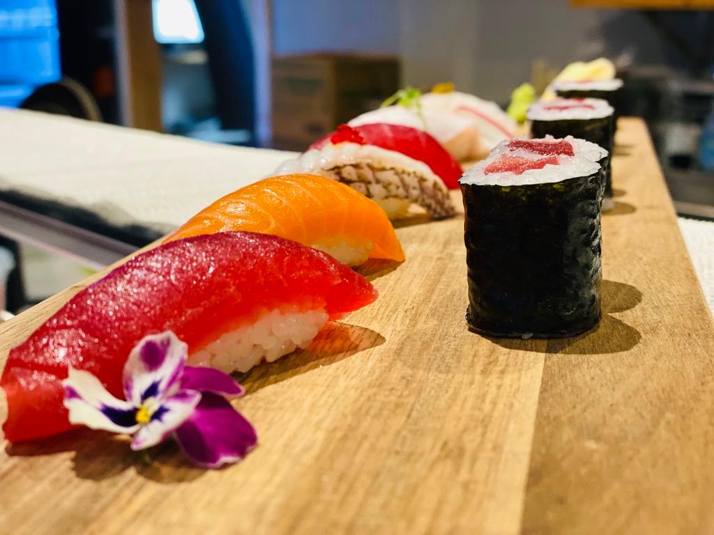 Sushi Dinner · 9 pieces assorted sushi & Tuna roll. Raw.