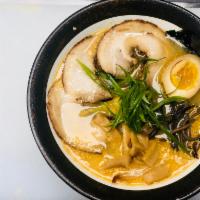 Tonkotsu Ramen · Pork bone broth. Wavy egg noodle. Topped with cashu pork, kikurage mushroom, bamboo shoot, s...