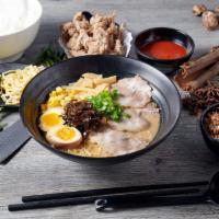 Black Garlic Japanese White Miso Ramen · Japanese bean paste as base, pork bone broth, slices chashu and choice of noodle.