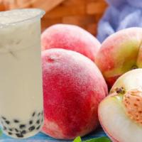 Signature Peach Milk Tea · Peach to the max, Cream and refreshing tea.