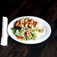 Shish Tawook · Grilled marinated chicken breast.