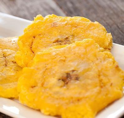 Tostones Rellenos · 3 crispy tostones filled with choice of protein.