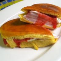Elena Ruth Sandwich · Sliced turkey, cream cheese and jelly on sweet bread.