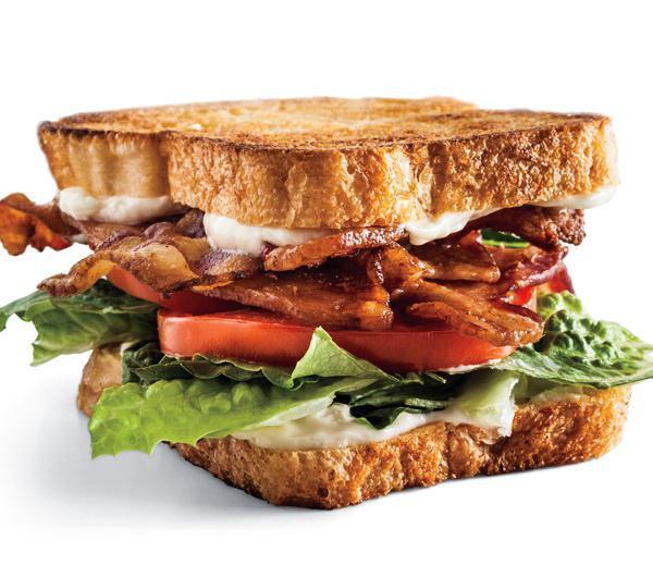 Club Sandwich · Sliced turkey, Swiss cheese, lettuce, tomatoes, bacon and Mayo on white toast served with french fries.