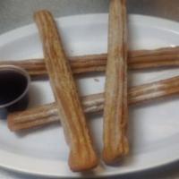 Churros Deluxe · Served with ice cream.