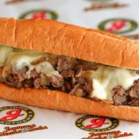 Cheesesteak · Choice of steak or chicken, grilled onions and American cheese.