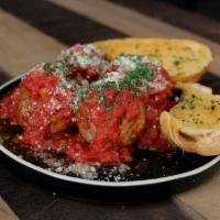 Meatballs with Marinara Sauce and Parmesan Cheese · 4 pieces.