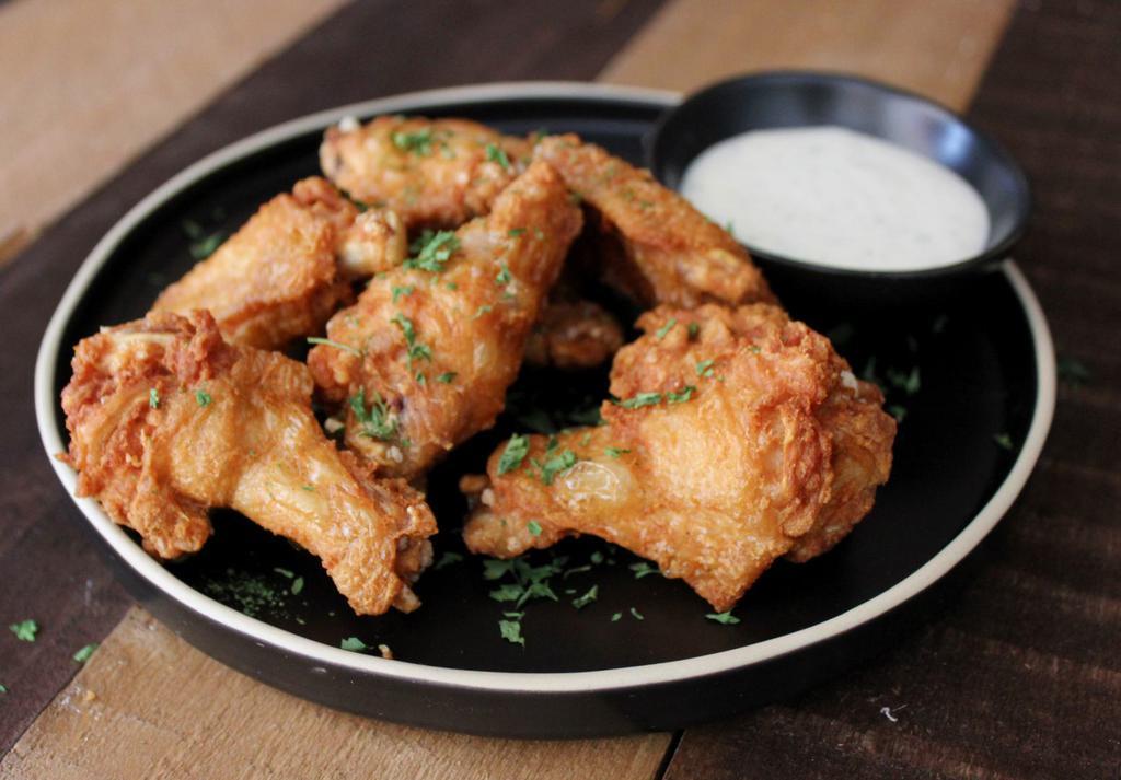 Buffalo Chicken Wings · Served with a choice of sauce. Served with ranch or blue cheese.