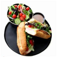 Smoked Turkey Sandwich · Mayo, mustard, smoked turkey, provolone cheese, red onions, cherry tomatoes, organic mixed g...