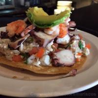 Supreme Tostada · Shrimp ceviche topped with cooked shrimp and octopus.