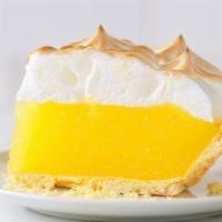 Lemon Meringue Pie Slice · Whipped and baked egg whites are toasted to golden brown to make the light, fluffy meringue ...
