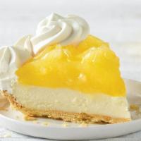 Lemon Supreme Pie Slice · Tangy lemon filling over cool, creamy supreme filling inside our flaky, golden pie crust, th...
