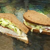 C12. Baja Turkey Sandwich · Juicy turkey, bacon, avocado, pepper with jalapeno jack cheese.