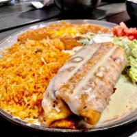 Chimichanga  · 1 flour tortilla, deep-fried, and filled with your meat of choice. Topped with cheese sauce....