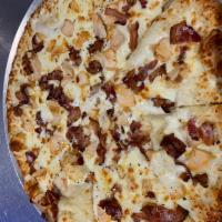 Chicken Ranch Pizza · Ranch dressing sauce, grilled white meat chicken and bacon bits.